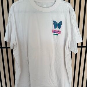 Nike White Tee with Vibrant Butterfly Design
